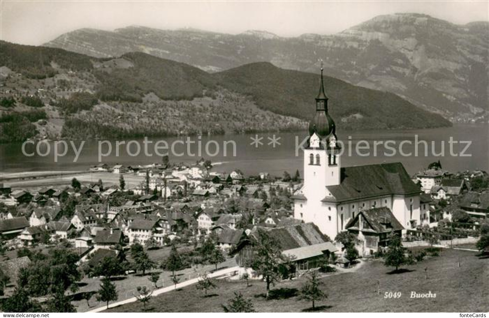 13728583 Buochs Vierwaldstaettersee Panorama mit Kirche Buochs Vierwaldstaetters