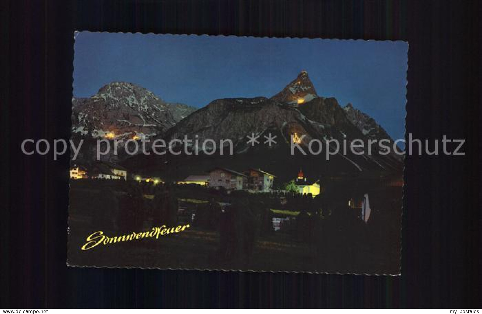 72064087 Ehrwald Tirol Sonnwendfeuer Sonnenspitze bei Nacht Ehrwald