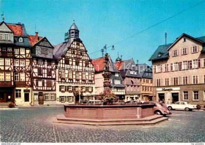 72914789 Butzbach Marktbrunnen Rathaus Fachwerkhaeuser Butzbach