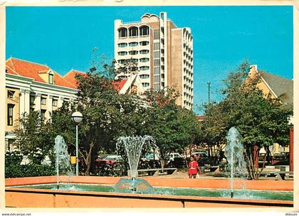 Antilles - Antilles Neérlandaises - Netherlands Antilles - Curaçao - Wilhelmina Park with the tower of the Curaçao Plaza