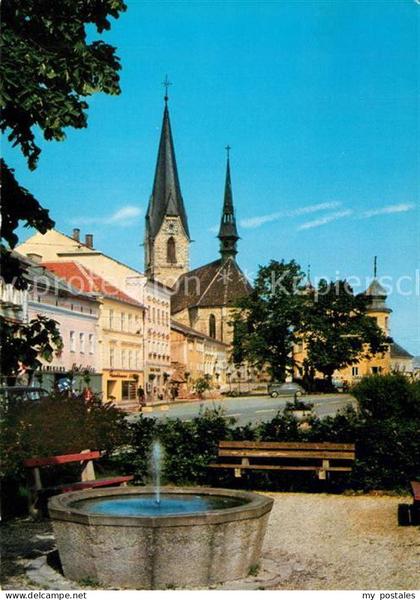 73359447 Bad Leonfelden Ortspartie mit Brunnen und Kirche Bad Leonfelden