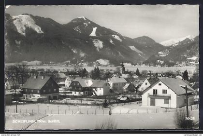 AK Scheifling, Ortspartie mit Bergen im Schnee