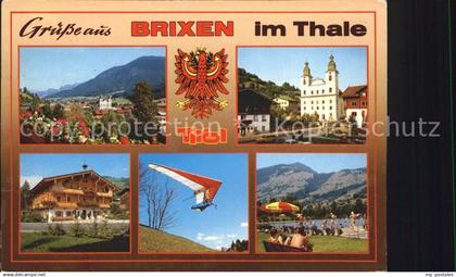 72270890 Brixen Thale Panorama Kirche Hotel Freibad Drachenfliegen Brixen im Tha