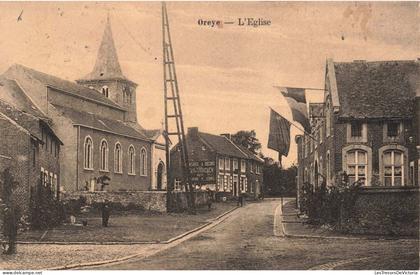 [-20%] BELGIQUE - Oreye - L'Eglise - Drapeau - Village - animé - Carte Postale Ancienne