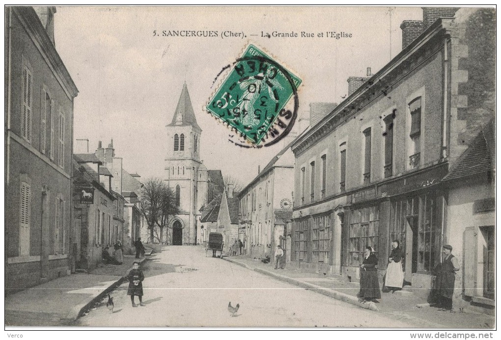 Carte Postale Ancienne de : SANCERGUES - La Grande Rue et l'Eglise