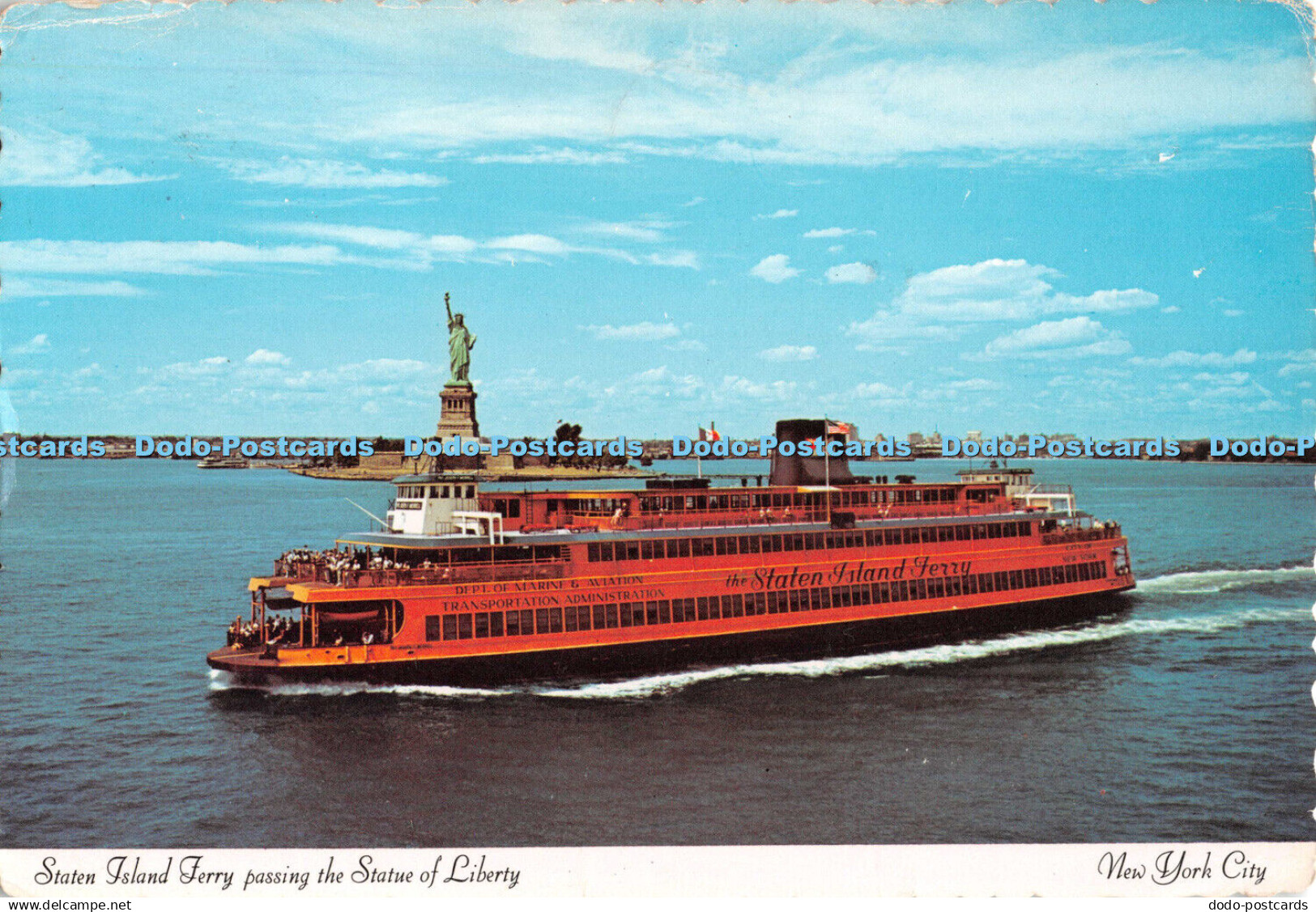 D107086 New York City. Staten Island Ferry Passing the Statue of Liberty. Manhat