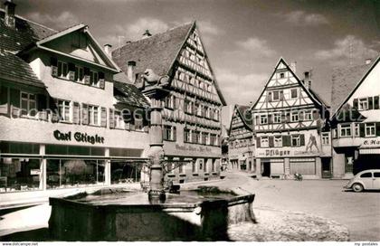 42842962 Muensingen Marktplatz mit Brunnen Muensingen