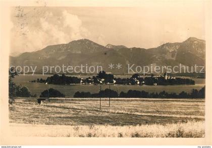 73143740 Chiemsee Panorama mit Fraueninsel Chiemgauer Alpen