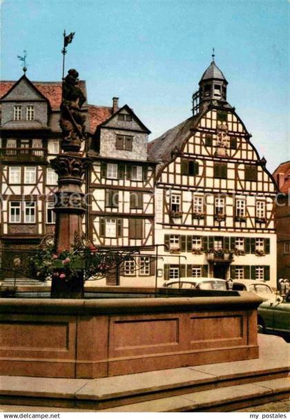 72914791 Butzbach Marktplatz Brunnen Fachwerkhaeuser Butzbach