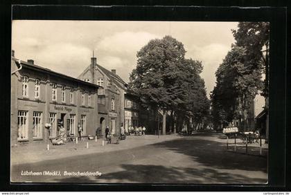 AK Lübtheen i. M., Breitscheidstrasse mit Handlung von Heinrich Plügge