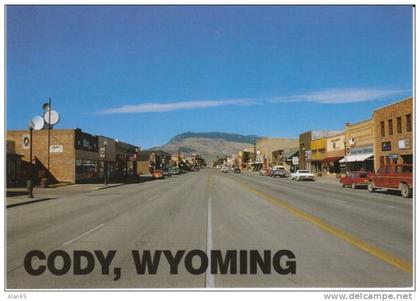 Cody WY Wyoming, Street Scene Business Signs, Autos, on c1980s Vintage Postcard