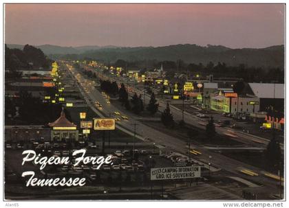 Pigeon Forge TN Tennessee, Main Street View of Town at Night, Restaurant Signs Gas Station, c1990s Vintage Postcard