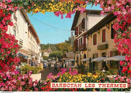 32 - Barbotan les Thermes - Rue piétonne - Fleurs - CPM - Voir Scans Recto-Verso