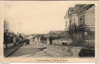 CPA VILLEMOMBLE - Une rue du Centre (124250)