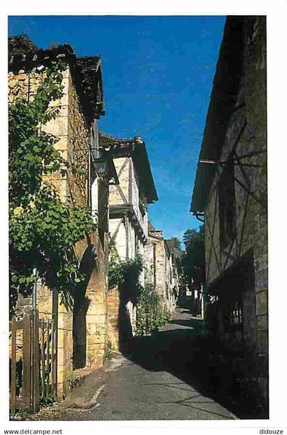 46 - Saint Cirq Lapopie - Une Rue typique - CPM - Voir Scans Recto-Verso