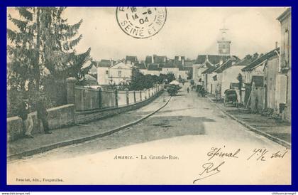 * AMANCE - Grande Rue - Animée - Edit. REUCHET - 1904