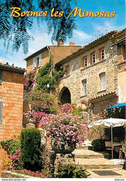 83 - Bormes les Mimosas - Rue fleurie - Fleurs - CPM - Voir Scans Recto-Verso