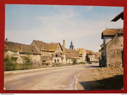 CPM - Faubourg de Diemeringen -(B.-Rhin.)