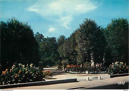 42 - Feurs - Le Jardin public - Fleurs - CPM - Voir Scans Recto-Verso