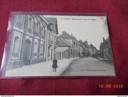 CPA - La Loupe - Gendarmerie et rue de l'Eglise