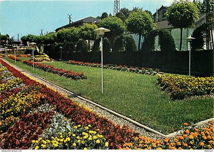 42 - Le Chambon-Feugerolles - Le Jardin près de la Gare - Fleurs - CPM - Voir Scans Recto-Verso