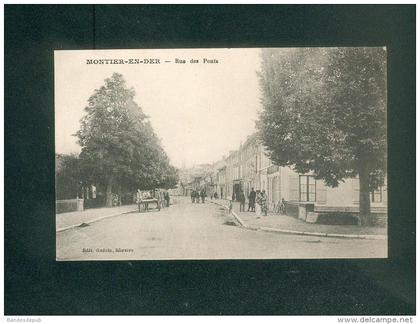 Montier en Der (52) - Rue des Ponts ( animée Café des Voyageurs Ed. Guerin libraire)