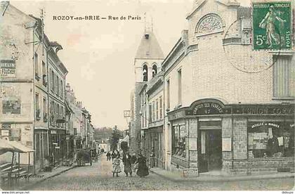 77 - Rozay en Brie - Rue de Paris - Animée - Oblitération ronde de 1912 - CPA - Voir Scans Recto-Verso