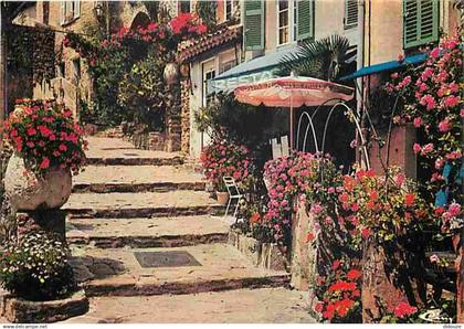 83 - Bormes les Mimosas - Rue fleurie - Fleurs - CPM - Voir Scans Recto-Verso