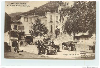 LUCERAM  - la place Adrien Barralis, voiture.