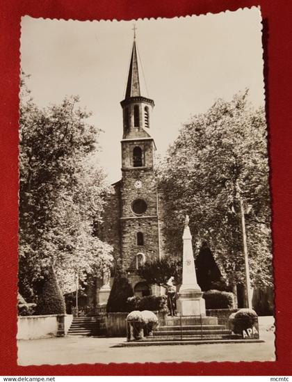 CPSM grand format -  Montredon Labessonnie  -(Tarn )  L'église et le Monument  (Montredon Labessonie)