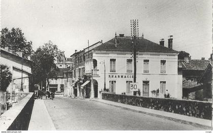 CPSM Tartas Le Pont et la rue Neuve