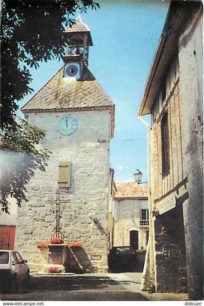 47 - Tournon d'Agenais - Le beffroi et son cadran lunaire - Automobiles - Voir Timbre - CPM - Voir Scans Recto-Verso