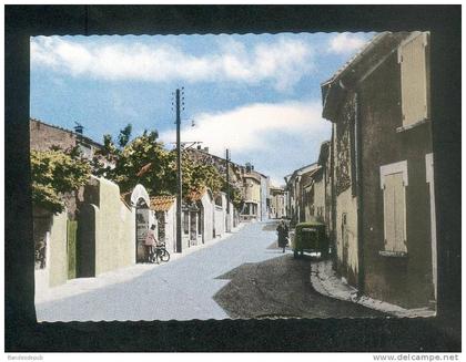 CPSM - Morières les Avignon (84) - Rue de la Paix ( animée voiture vélo Ed. Caujolle )