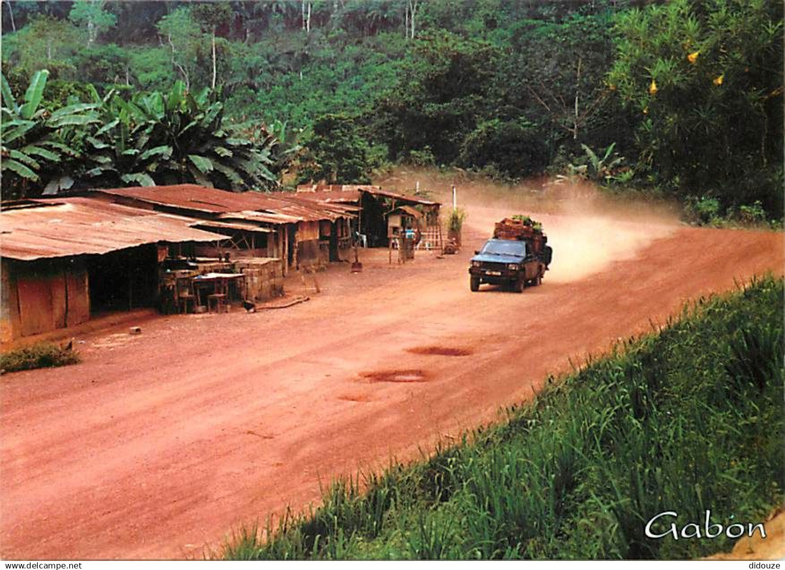 Gabon - Le gabon en Tropicolor - Piste Ndjole-Mitzic au carrefour de Lalara - Automobiles - CPM - Voir Scans Recto-Verso