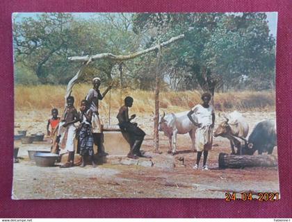 CPM GF - The Gambia - At village well