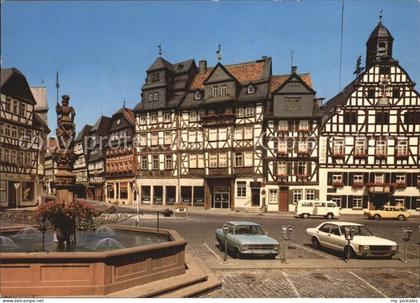 72439716 Butzbach Marktplatz Brunnen Fachwerkhaeuser Butzbach