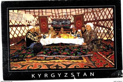 Kirghizistan - Kyrgyzstan old friends gather in a  yurt to chat over bread, tea & snacks - ! TEAR