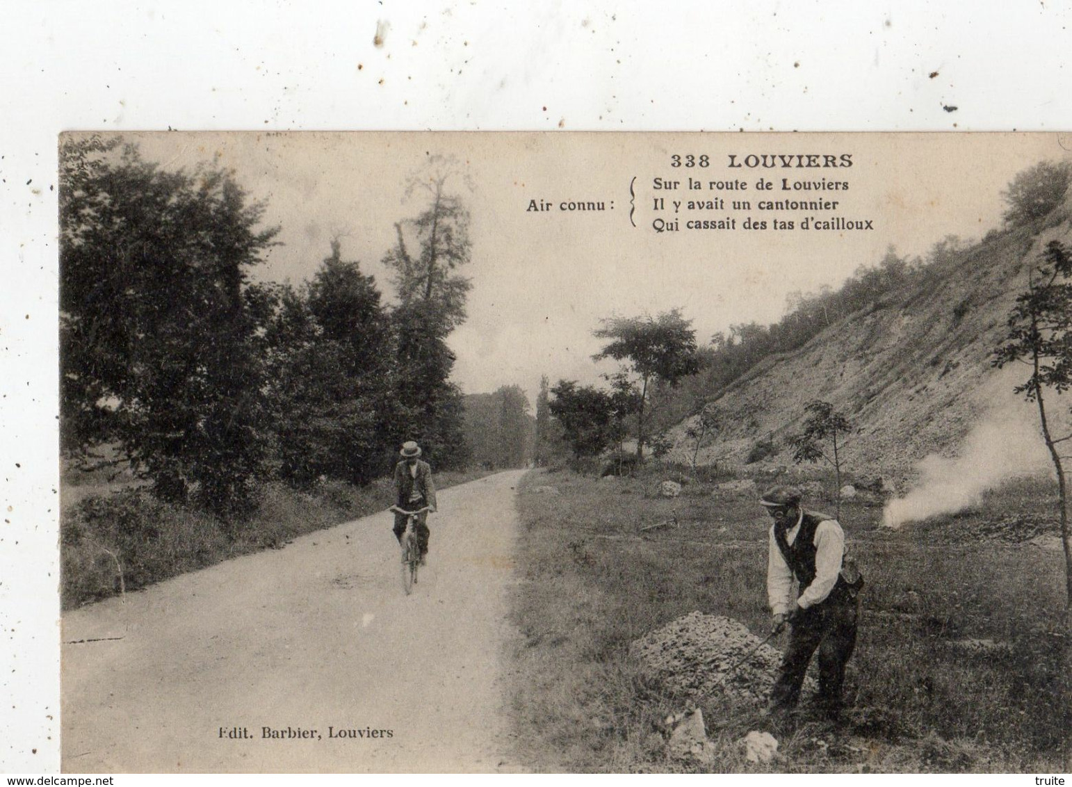 LOUVIERS CANTONNIER QUI CASSE DES CAILLOUX