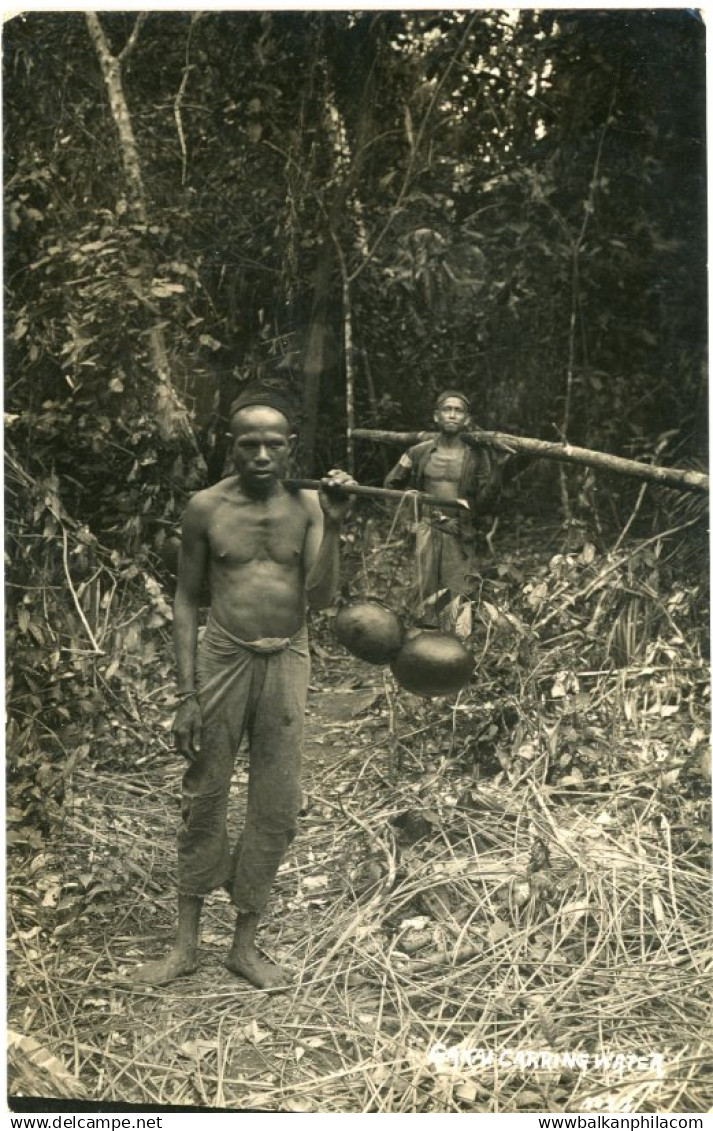 Malaysia Sakai Orang Asli Carrying Water