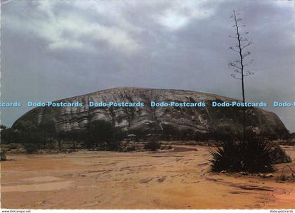 D030854 Ayers Rock turned black by a rainstorm. Stan Cawood. Alice Springs Tours