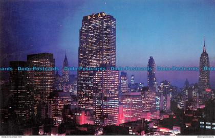R081508 Night Falls on Midtown Manhattan. New York City. Manhattan Post Card. De