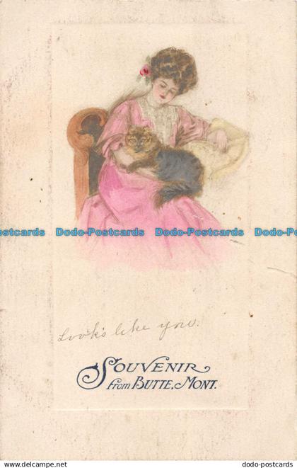 R161786 Souvenir from Butte Mont. Woman with Cat