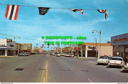R526047 Broadway. Looking East. Hobbs. New Mexico. Gene Aiken. Color King. W. M.