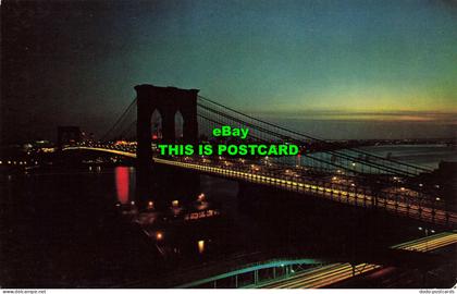 R573076 Brooklyn Bridge. New York City. Night view of Brooklyn Bridge. Plastichr