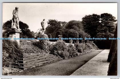 R738463 Renishaw Hall Statues by Cagliari Country Life