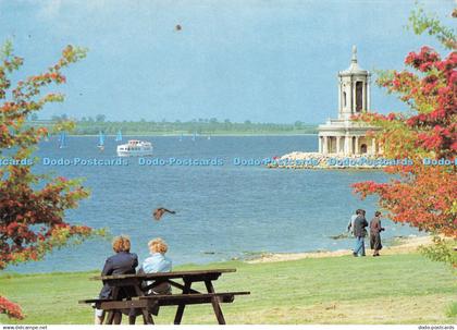 D031563 The Rutland Belle sailing past Normanton Church. Museum at Rutland Water