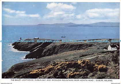 D063998 Ireland. Dublin. The Bailey Lighthouse. Dublin Bay and Wicklow Mountains