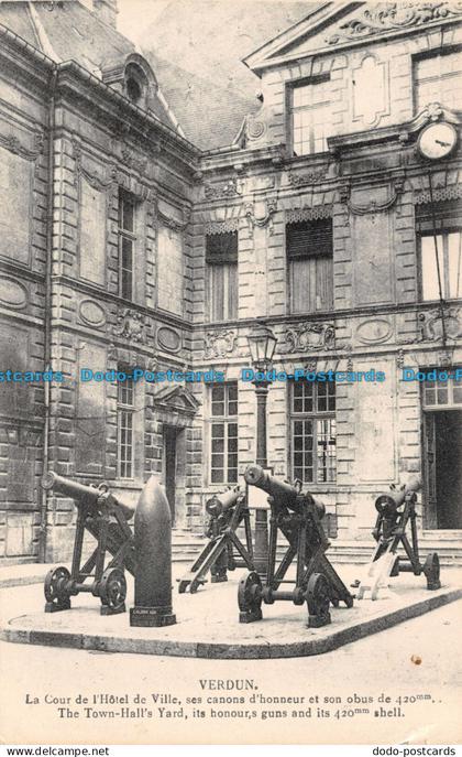 R135628 Verdun. The Town Halls Yard. Its honours guns and its shell. H. Fremont