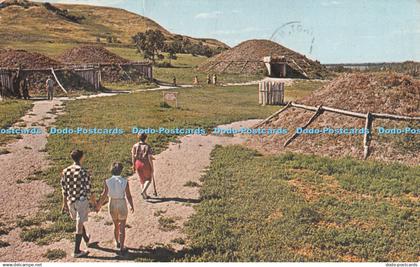 R295605 Mandan Indian Village Ceremonial Lodge in the background 59 Montana Post