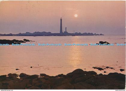 D144317 Plouguerneau. N. Finist. Coucher de Soleil sur le Phare de Lilia. Combie